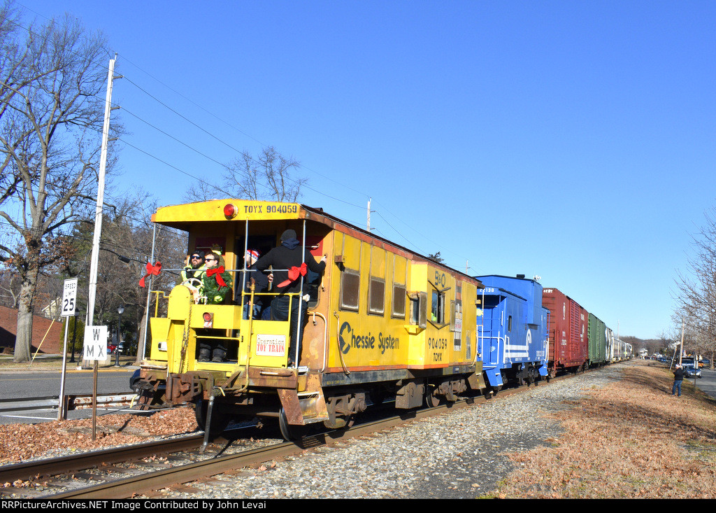 The two cabooses bringing up the rear of the train as it heads toward the Hawthorne collection point along Royal Ave and Warburton Ave 